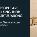 Moldy bathtub caulk in an NYC bathroom, illustrating common re-caulking mistakes - RenovationServices.com guide.